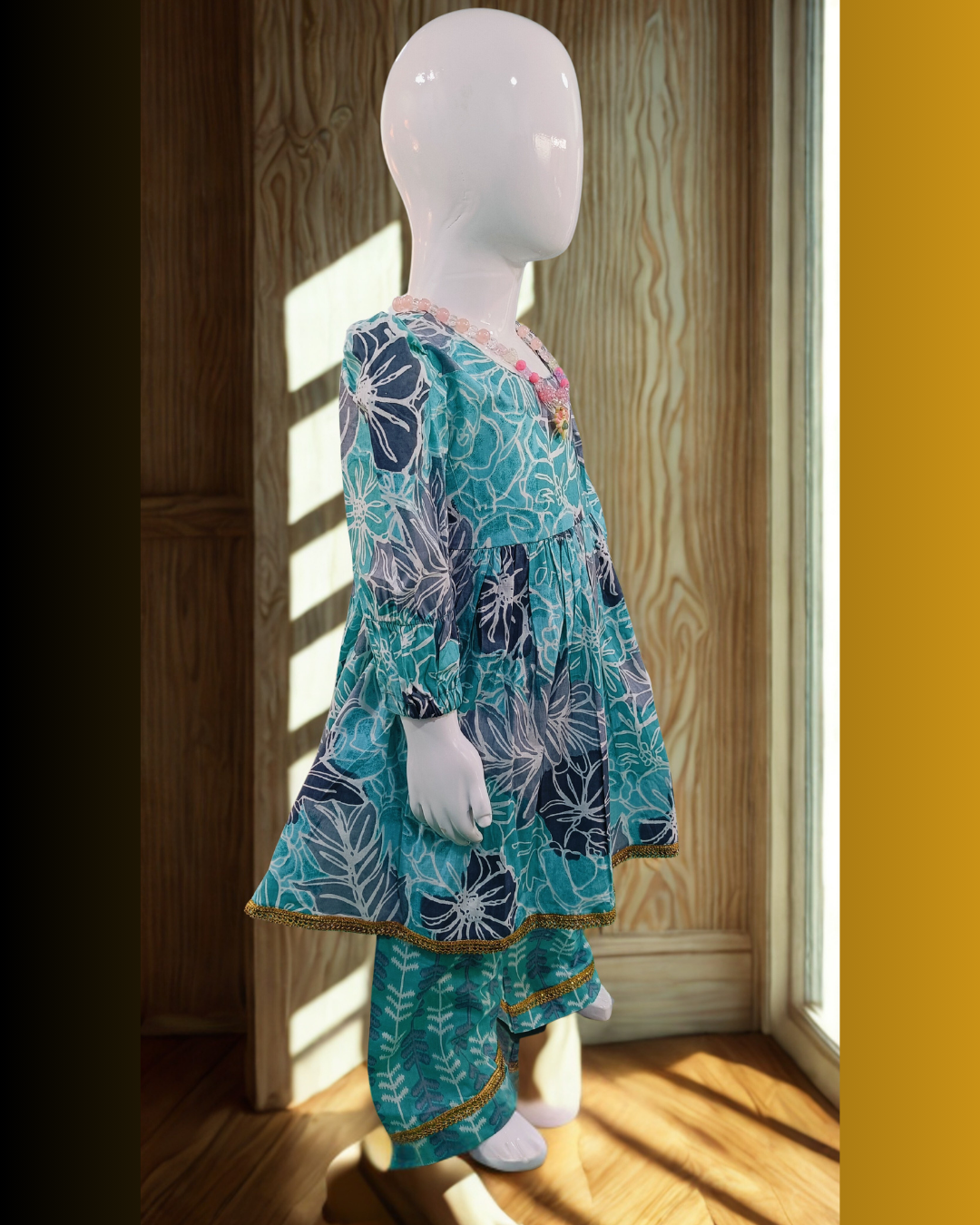 Baby girl aqua blue cambric cotton printed kurti pajama set side view daily wear