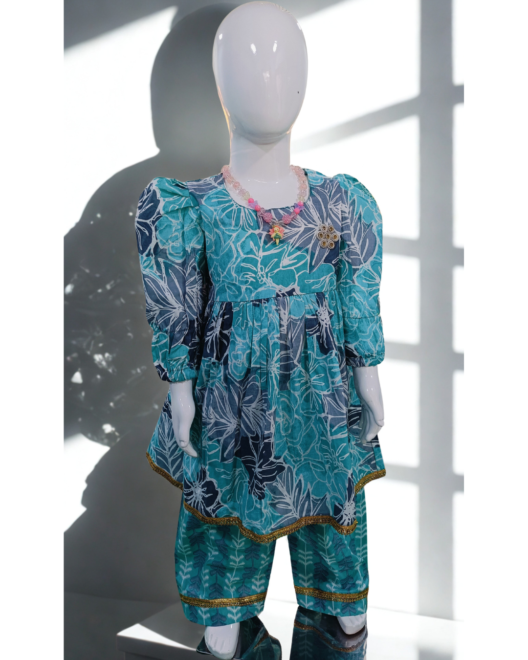 Baby girl aqua blue cambric cotton printed kurti pajama set front view daily wear