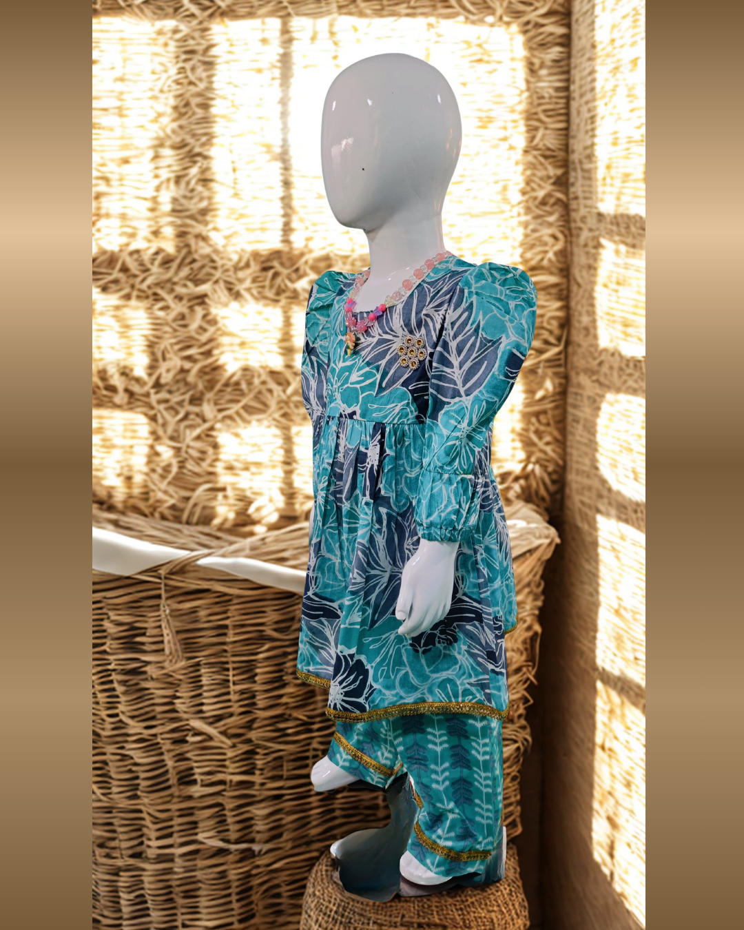 Baby girl aqua blue cambric cotton printed kurti pajama set styled side view